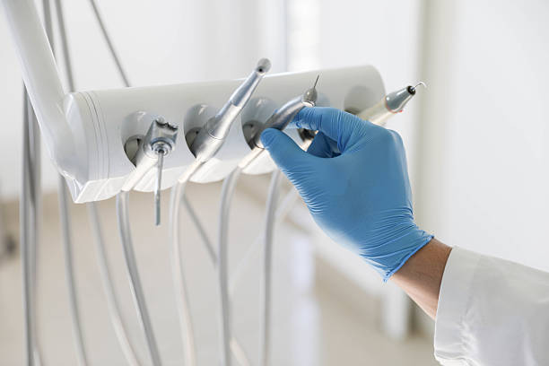Professional Tooth Extraction technician working in Santa Clara, CA